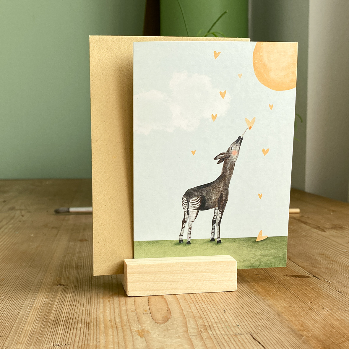 Wenskaartje Okapi met hartjes