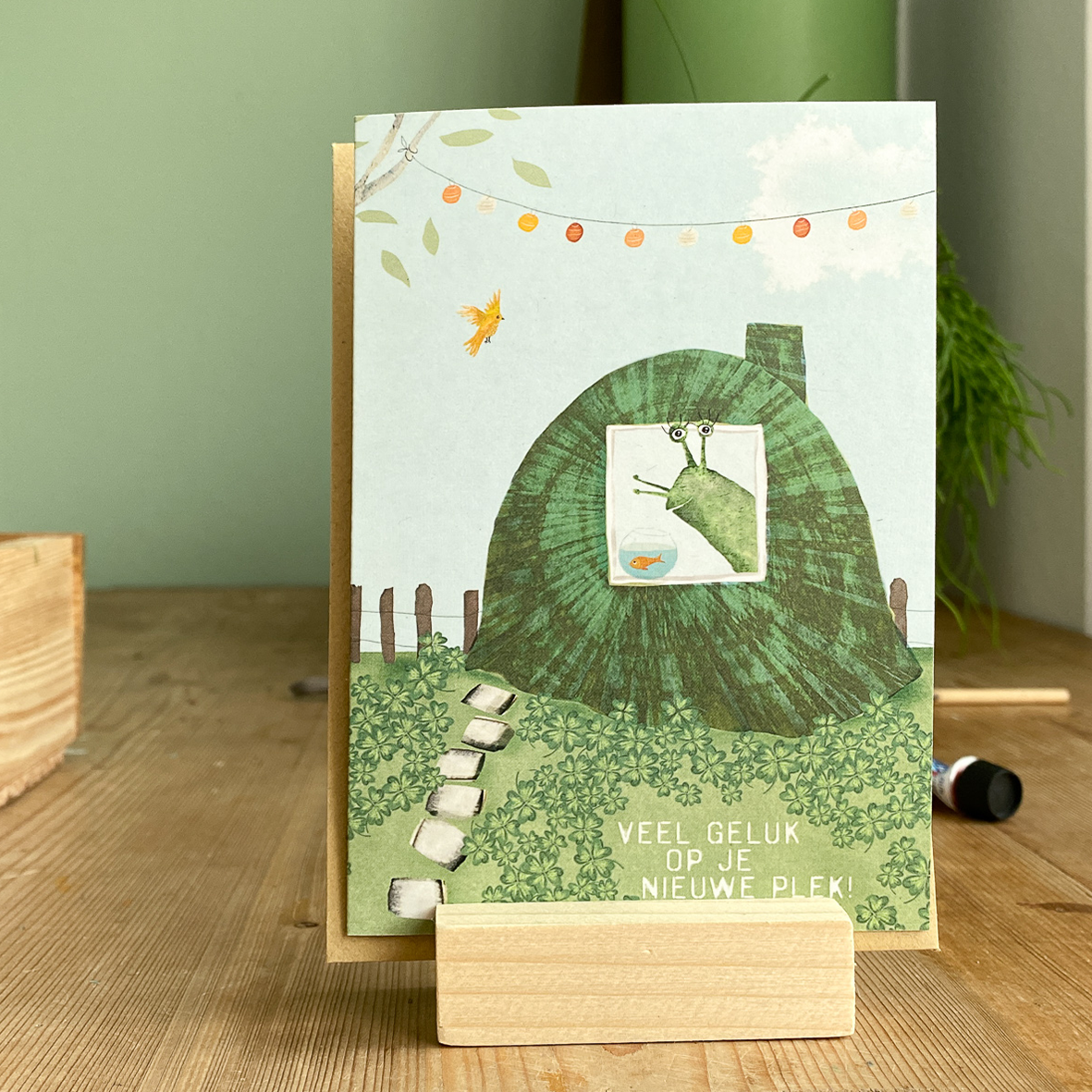 Wenskaartje Nieuw huis met slakkenhuisje, boompje, beestje